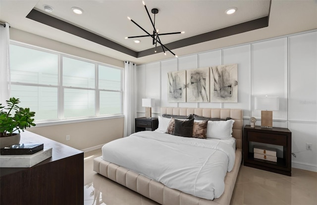 13533 Pearl Beach St, Winter Garden, FL 34787 - bedroom with a raised ceiling, a chandelier, light tile patterned floors, and recessed lighting