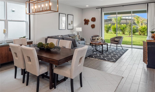 4409 Lions Gate Ave, Clermont, FL 34711 - dining space with a chandelier, recessed lighting, and light wood-type flooring