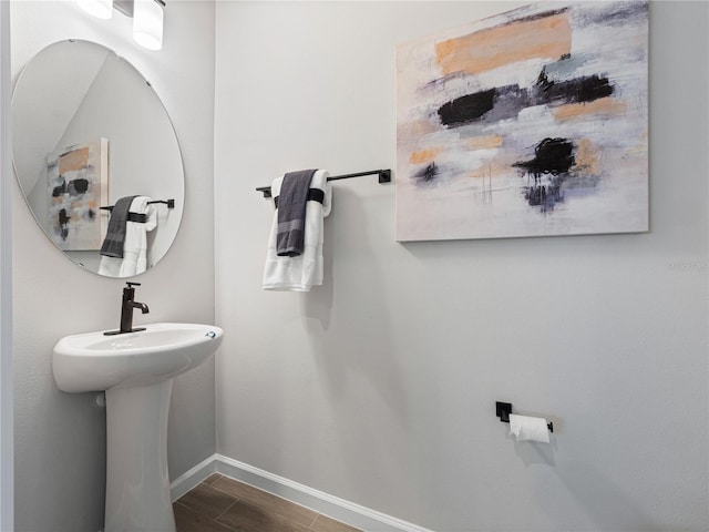 4409 Lions Gate Ave, Clermont, FL 34711 - bathroom with baseboards and wood finished floors
