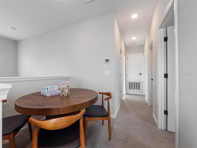 4409 Lions Gate Ave, Clermont, FL 34711 - dining room featuring light colored carpet and recessed lighting