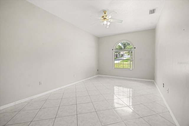 13848 Vista Del Lago Blvd, Clermont, FL 34711 - empty room with ceiling fan and light tile patterned floors