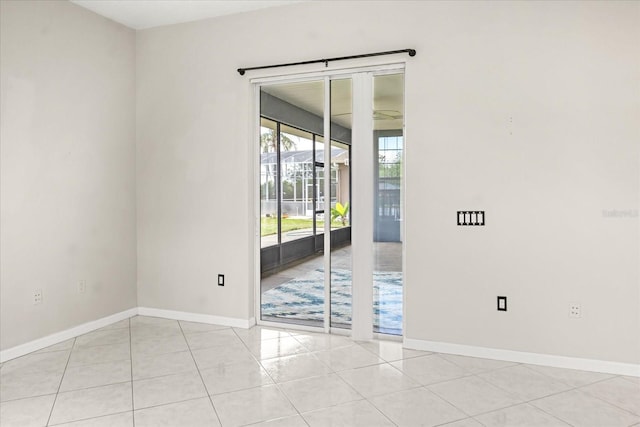 13848 Vista Del Lago Blvd, Clermont, FL 34711 - spare room featuring baseboards and light tile patterned floors