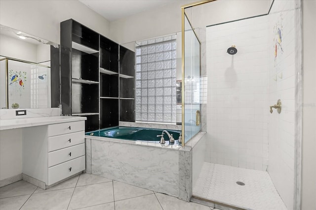 13848 Vista Del Lago Blvd, Clermont, FL 34711 - full bathroom featuring a stall shower, a bath, vanity, and tile patterned floors