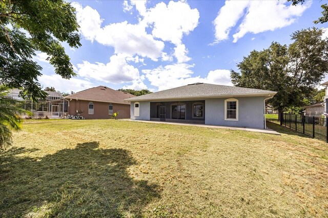 13848 Vista Del Lago Blvd, Clermont, FL 34711 - back of house featuring stucco siding