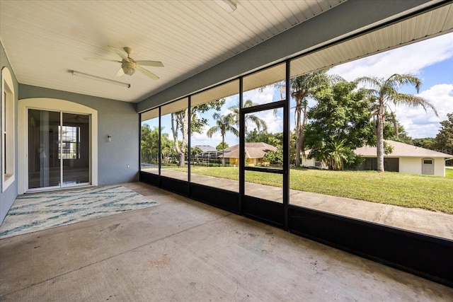 13848 Vista Del Lago Blvd, Clermont, FL 34711 - unfurnished sunroom featuring ceiling fan
