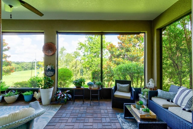 30210 Donnington Loop, Mount Dora, FL 32757 - sunroom / solarium with a ceiling fan, outdoor lounge area, and brick flooring