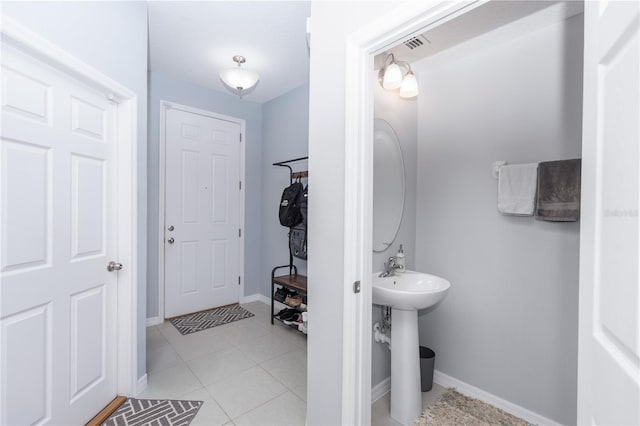 4733 Cliveden Loop, Sanford, FL 32773 - bathroom with tile patterned flooring and baseboards