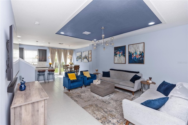 4733 Cliveden Loop, Sanford, FL 32773 - living room with recessed lighting and a chandelier