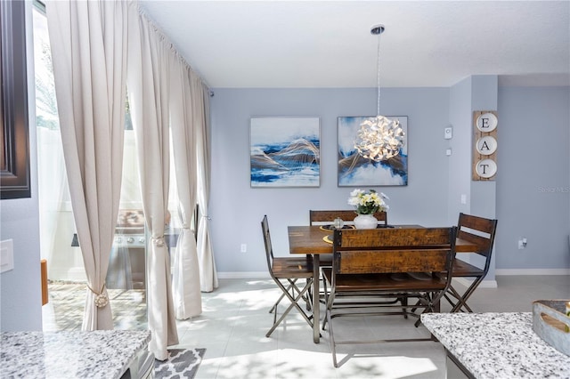 4733 Cliveden Loop, Sanford, FL 32773 - dining room with a chandelier, light tile patterned floors, and plenty of natural light