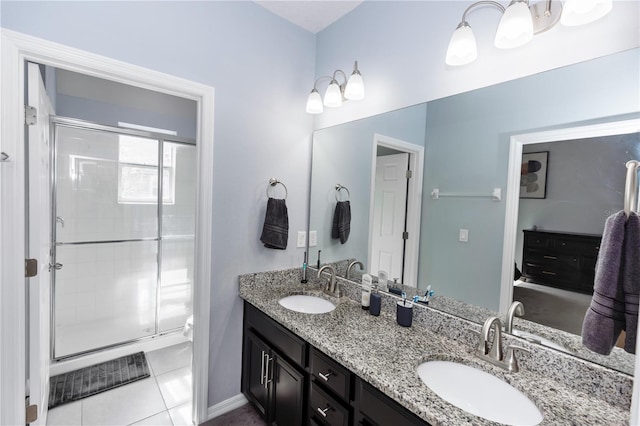 4733 Cliveden Loop, Sanford, FL 32773 - full bathroom featuring double vanity, a stall shower, and tile patterned floors