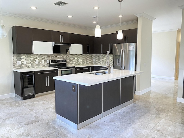 4375 Foxtail Ln, Weston, FL 33331 - kitchen featuring stainless steel appliances, wine cooler, dark cabinets, tasteful backsplash, and ornamental molding