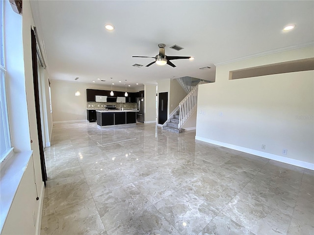 4375 Foxtail Ln, Weston, FL 33331 - unfurnished living room with ceiling fan, stairway, recessed lighting, crown molding, and light marble finish floors