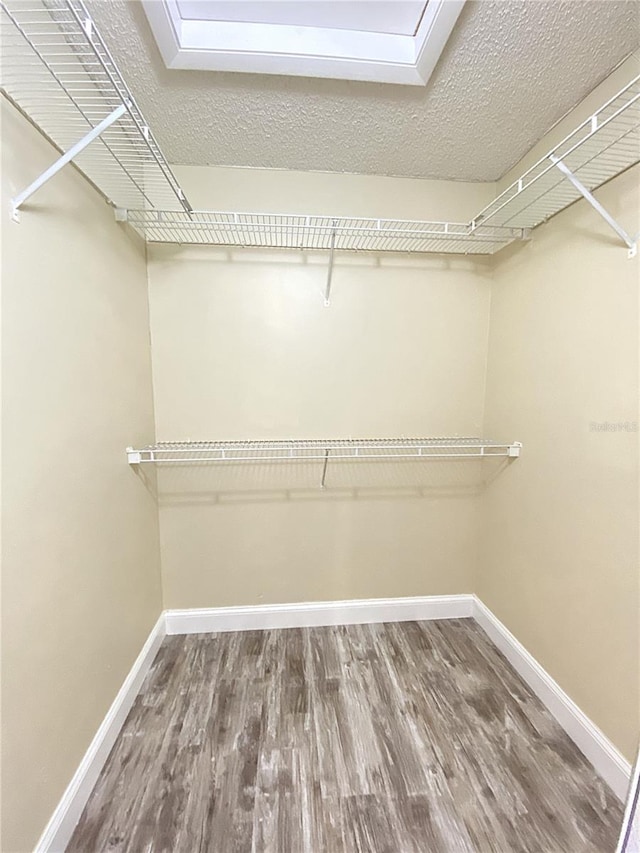4375 Foxtail Ln, Weston, FL 33331 - walk in closet with wood finished floors