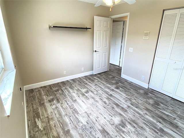 4375 Foxtail Ln, Weston, FL 33331 - unfurnished bedroom featuring wood finished floors, a closet, and ceiling fan