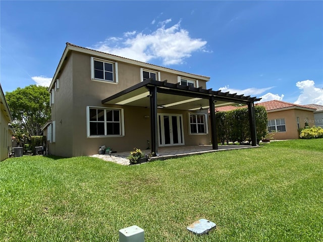 4375 Foxtail Ln, Weston, FL 33331 - rear view of house with french doors, stucco siding, a lawn, a patio, and a pergola
