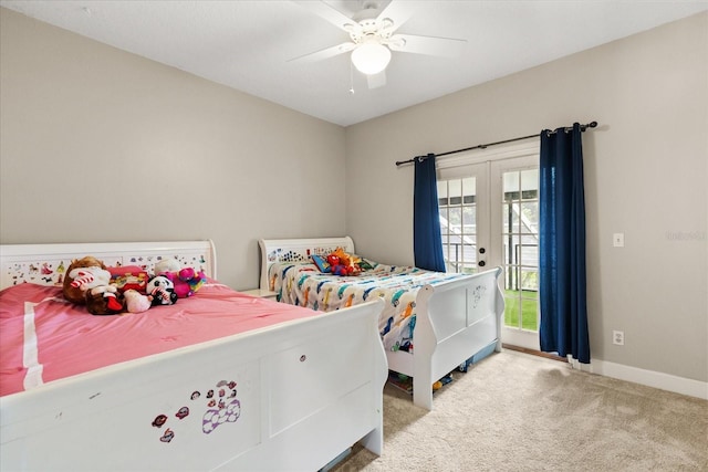 8800 Torey Pines Ter, Orlando, FL 32819 - carpeted bedroom with access to exterior, a ceiling fan, and french doors