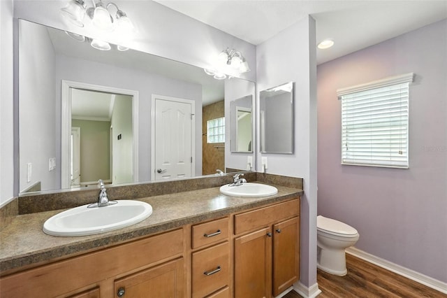 2895 Apache Ct, The Villages, FL 32163 - full bathroom with double vanity and wood finished floors