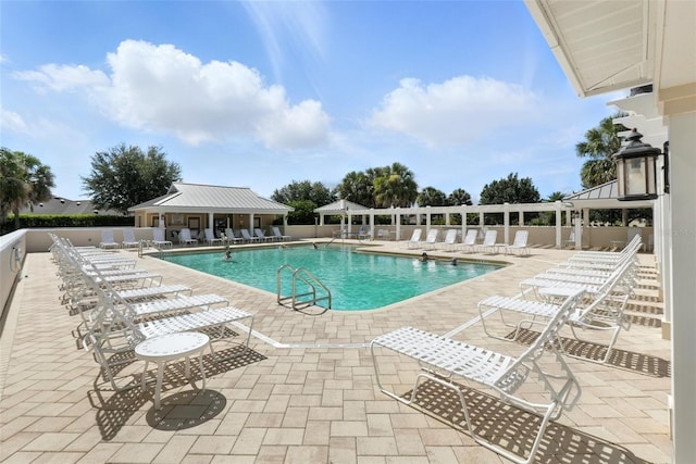 2895 Apache Ct, The Villages, FL 32163 - community pool featuring a gazebo and a patio