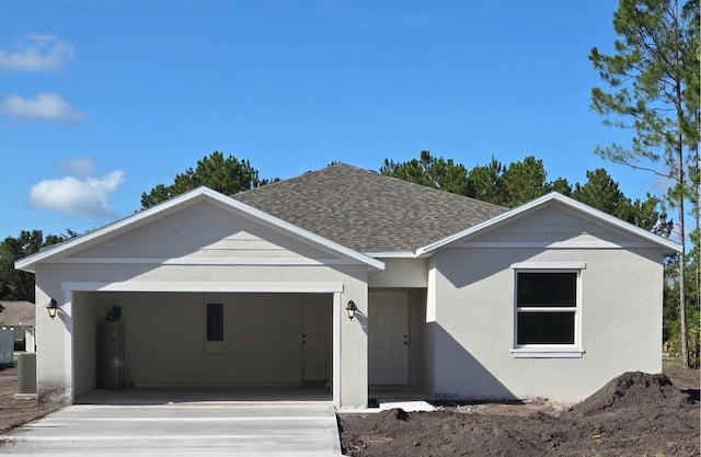 15 Buffalo Meadow Ln, Palm Coast, FL 32137 - ranch-style home featuring an attached garage, a shingled roof, driveway, and stucco siding