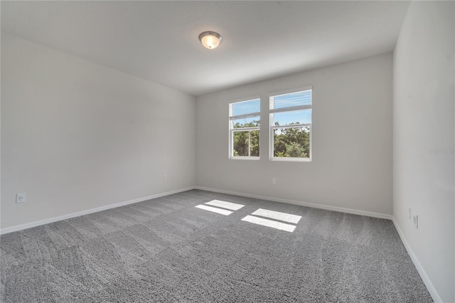 172 S Zuni Rd, Saint Cloud, FL 34771 - empty room with carpet flooring and baseboards