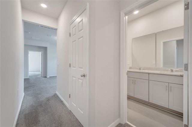 172 S Zuni Rd, Saint Cloud, FL 34771 - hall with light carpet and recessed lighting