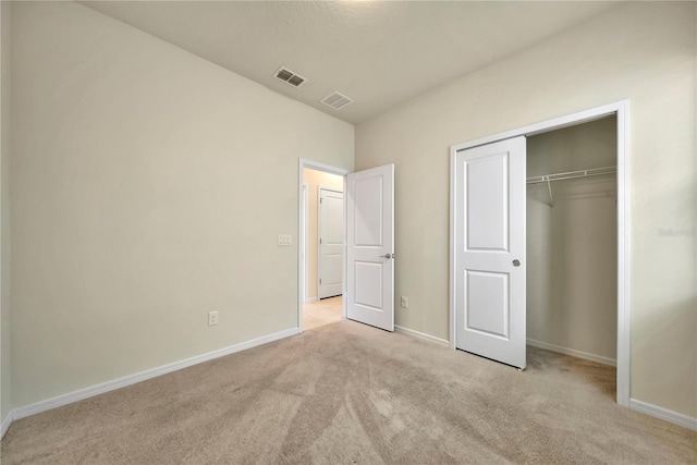 2601 Blowing Breeze Ave, Kissimmee, FL 34744 - unfurnished bedroom with carpet flooring and a closet