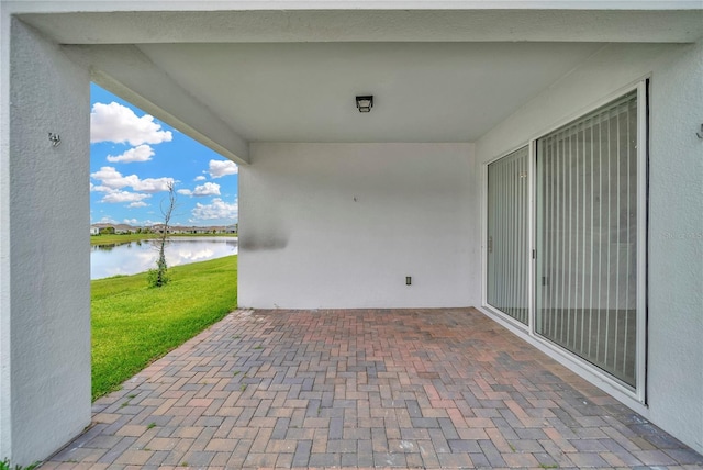 2601 Blowing Breeze Ave, Kissimmee, FL 34744 - view of patio / terrace featuring a water view