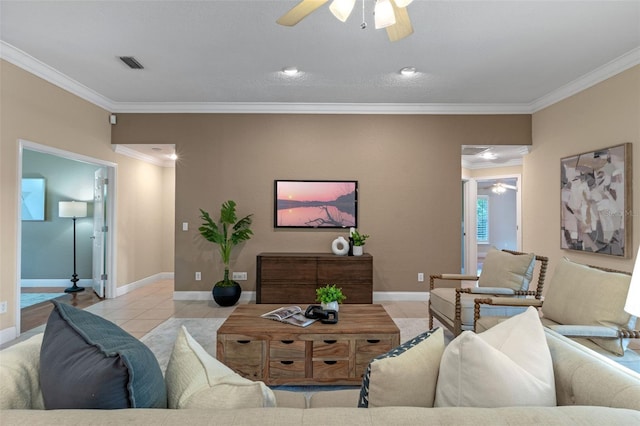 5102 Round Tree Ct, Orlando, FL 32819 - living room featuring ornamental molding, ceiling fan, and light tile patterned floors
