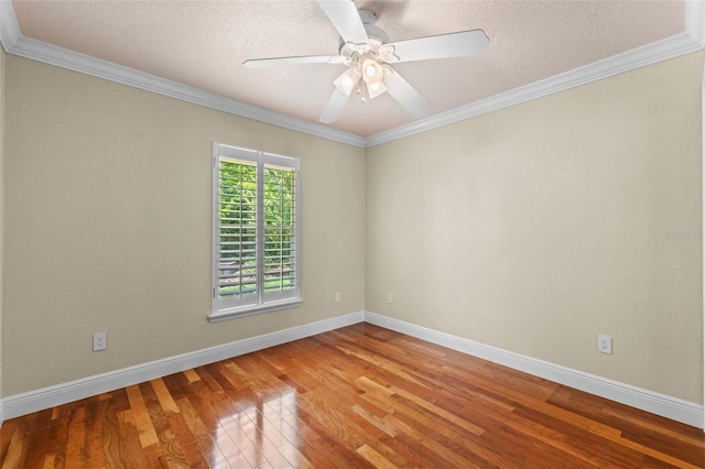 5102 Round Tree Ct, Orlando, FL 32819 - spare room with wood finished floors, crown molding, ceiling fan, and a textured ceiling