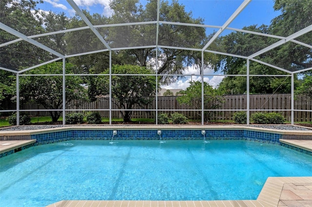 5102 Round Tree Ct, Orlando, FL 32819 - view of pool with a fenced backyard and glass enclosure