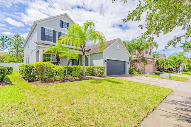 1639 Balsam Willow Trl, Orlando, FL 32825 - view of front of house featuring stucco siding, driveway, and a garage