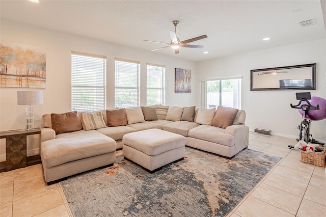 1639 Balsam Willow Trl, Orlando, FL 32825 - living area featuring light tile patterned floors, ceiling fan, and recessed lighting