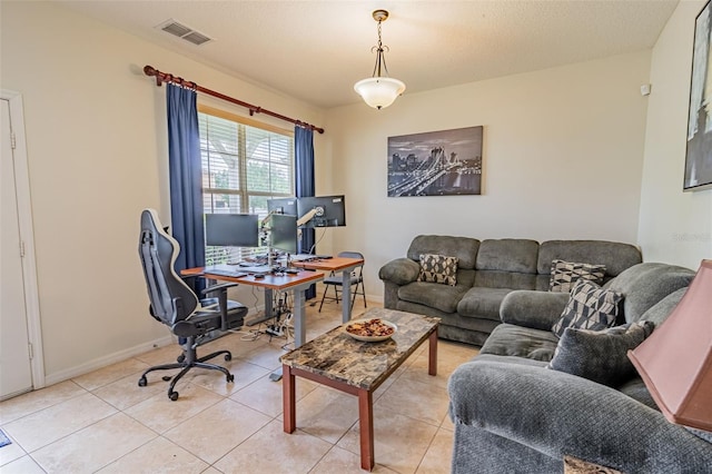 1639 Balsam Willow Trl, Orlando, FL 32825 - home office with baseboards and light tile patterned floors