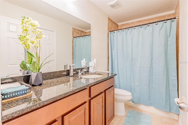 1639 Balsam Willow Trl, Orlando, FL 32825 - full bath with vanity, tile patterned floors, a shower with shower curtain, and a textured ceiling