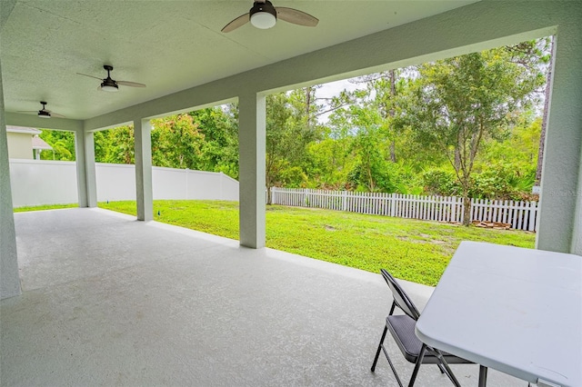 1639 Balsam Willow Trl, Orlando, FL 32825 - fenced backyard with a ceiling fan and a patio