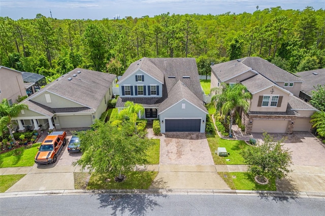 1639 Balsam Willow Trl, Orlando, FL 32825 - view of subject property featuring a heavily wooded area