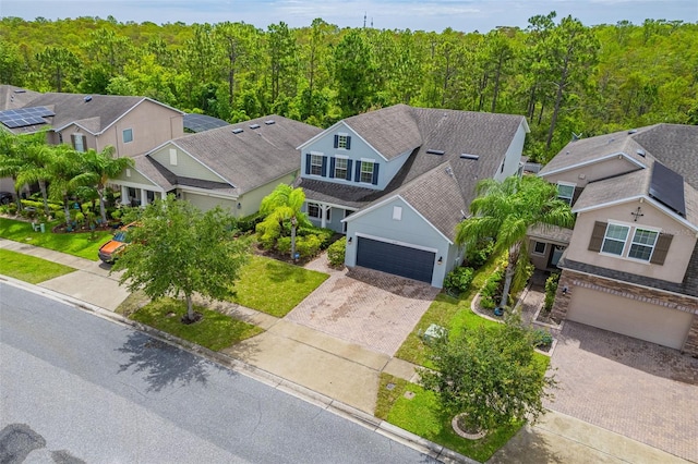 1639 Balsam Willow Trl, Orlando, FL 32825 - aerial perspective of suburban area with a forest