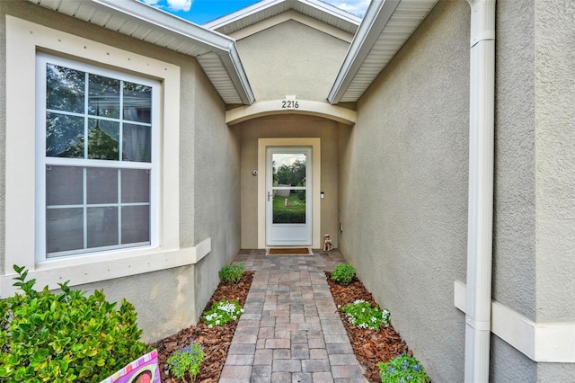 2216 Sequoia Way, Davenport, FL 33896 - view of exterior entry with stucco siding