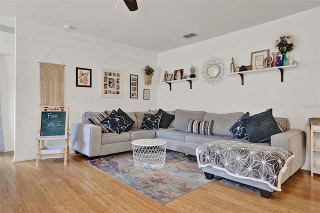 2216 Sequoia Way, Davenport, FL 33896 - living area featuring wood finished floors and a ceiling fan