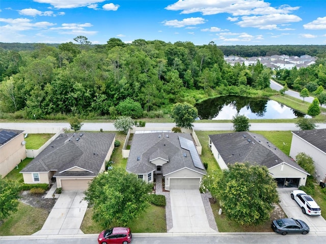 2216 Sequoia Way, Davenport, FL 33896 - aerial perspective of suburban area with a large body of water and a heavily wooded area