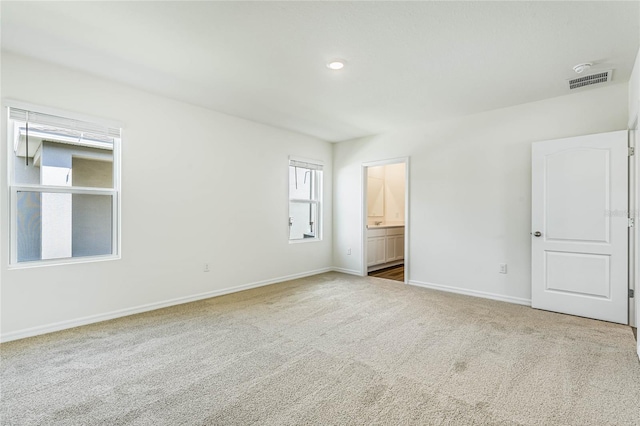 5662 Paddock Fence Ln, Apopka, FL 32712 - unfurnished bedroom with carpet, ensuite bathroom, and recessed lighting