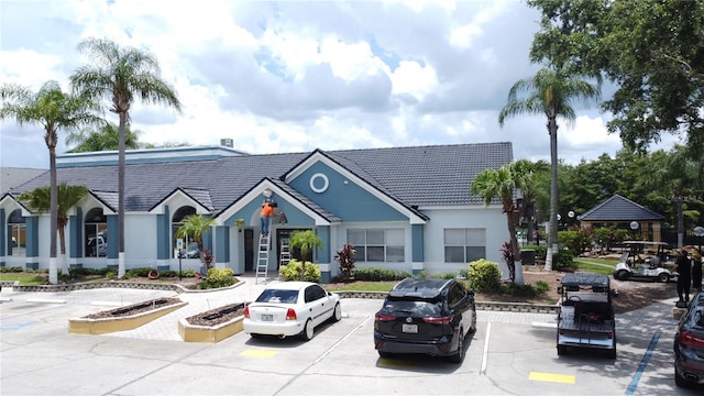 4606 Commander Dr Unit 1126, Orlando, FL 32822 - view of building exterior with uncovered parking