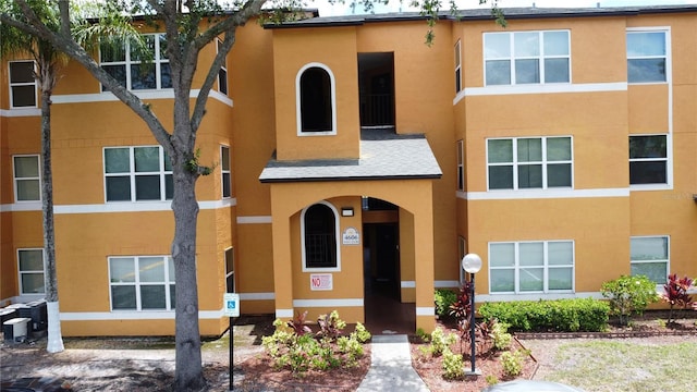 4606 Commander Dr Unit 1126, Orlando, FL 32822 - view of property featuring stucco siding