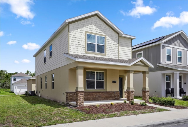 6449 Sprucepine Ln, Saint Cloud, FL 34771 - view of front of property with a front lawn, covered porch, roof with shingles, and stone siding