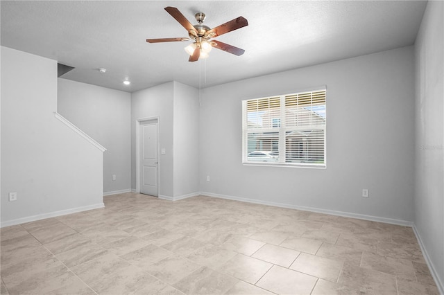 6449 Sprucepine Ln, Saint Cloud, FL 34771 - empty room with a ceiling fan and baseboards