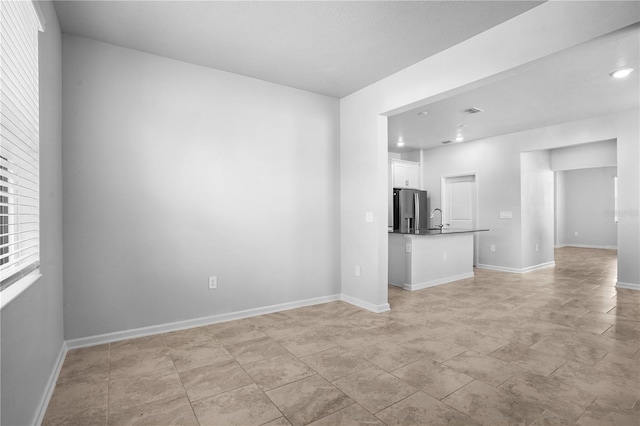 6449 Sprucepine Ln, Saint Cloud, FL 34771 - unfurnished room featuring baseboards and recessed lighting