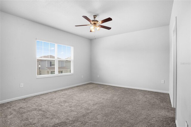 6449 Sprucepine Ln, Saint Cloud, FL 34771 - carpeted spare room with a ceiling fan and baseboards