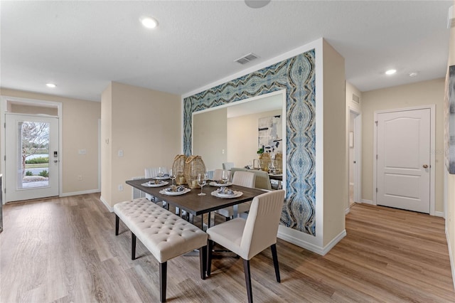 3349 Wynwood Forest Dr, Ocoee, FL 34761 - dining room featuring light wood-style floors and recessed lighting