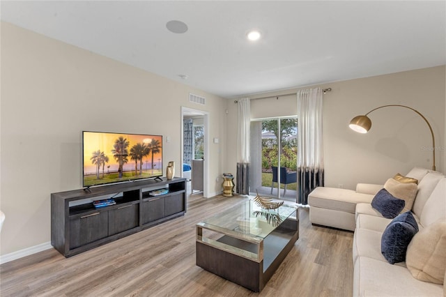 3349 Wynwood Forest Dr, Ocoee, FL 34761 - living room with wood finished floors and recessed lighting