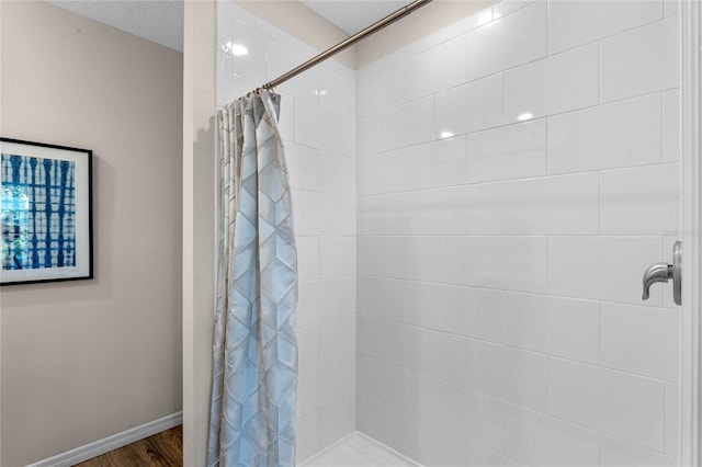 3349 Wynwood Forest Dr, Ocoee, FL 34761 - full bath featuring tiled shower and wood finished floors
